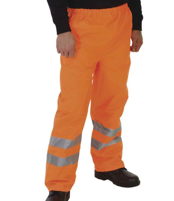 Orange Yoko branded hi-visibility waterproof overtrousers