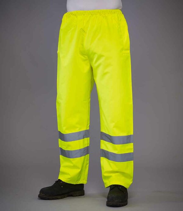 Yellow Yoko branded hi-vis waterproof overtrousers